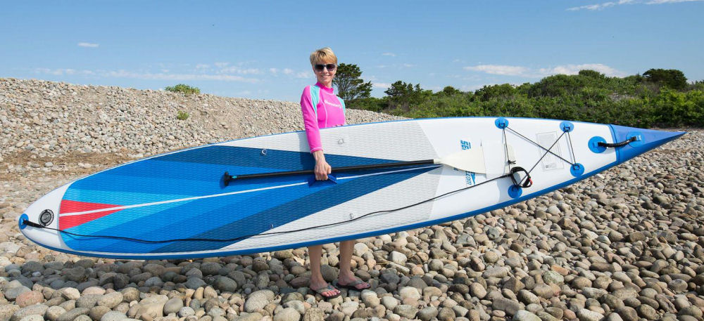 Woman Carrying Sea Eagle Needle Nose SUP